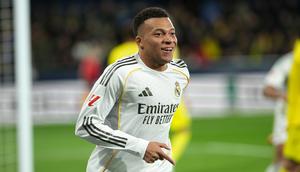 Bomber Real Madrid Kylian Mbappe merayakan golnya ke gawang Villarreal di jornada 21 Liga Spanyol 2025/2026 di La Ceramica, Minggu (25/01/2026) dini hari WIB. (AP Photo/Alberto Saiz)