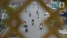 Kendaraan melintas di Jalan Margonda Raya, Depok, Jawa Barat, Rabu (21/10/2020). Satlantas Polrestro Kota Depok menguji coba sistem tilang elektronik bagi pengendara mobil dan motor yang rencananya akan diberlakukan pada 1 November 2020 mendatang. (Liputan6.com/Immanuel Antonius)