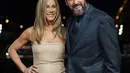 Baik Sandler maupun Aniston tidak hadir di ajang Oscar pada hari Minggu. Seperti yang dicatat oleh Cosmopolitan, Anda biasanya hanya diundang ke Oscar jika Anda adalah seorang nominator, bagian dari pembuatan film yang dinominasikan, penerima penghargaan kehormatan, mempersembahkan sebuah penghargaan, atau tamu dari seseorang yang diundang. (AP Photo/Lewis Joly)