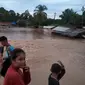 Luapan banjir yang melanda Bengkulu mengakibatkan ratusan rumah mengalami rusak dan hilang terbawa arus (Liputan6.com/Yuliardi Hardjo)