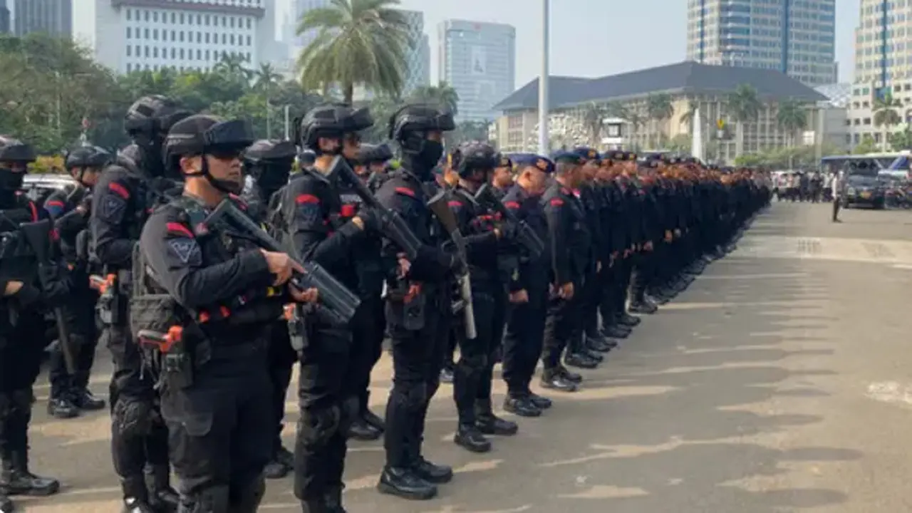 Petugas gabungan dalam pengamanan aksi 411/Liputan6