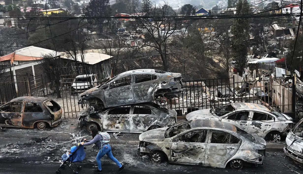 Pihak berwenang setempat menyebutkan lebih dari 1000 rumah hangus terbakar. (RODRIGO ARANGUA/AFP)