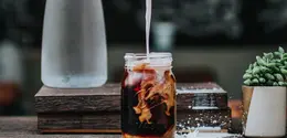 Ilustrasi kopi susu (Foto: unsplash.com/Tyler Nix)
