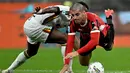 Laga ke-6 Serie A Italia 2024/2025 antara AC Milan menjamu Lecce berlangsung ketat dan sengit. (Gabriel BOUYS/AFP)