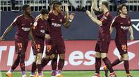 Para pemain Barcelona merayakan gol yang dicetak oleh Philippe Coutinho ke gawang Malaga pada laga La Liga di Stadion La Rosaleda, Sabtu (10/3/2018). Malaga takluk 0-2 dari Barcelona. (AP/M.Pozo)