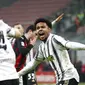 Pemain Juventus, Weston McKennie, melakukan selebrasi usai mencetak gol ke gawang AC Milan pada laga Liga Italia di Stadion San Siro, Rabu (6/1/2021). Juventus menang dengan skor 3-1. (AP/Antonio Calanni)