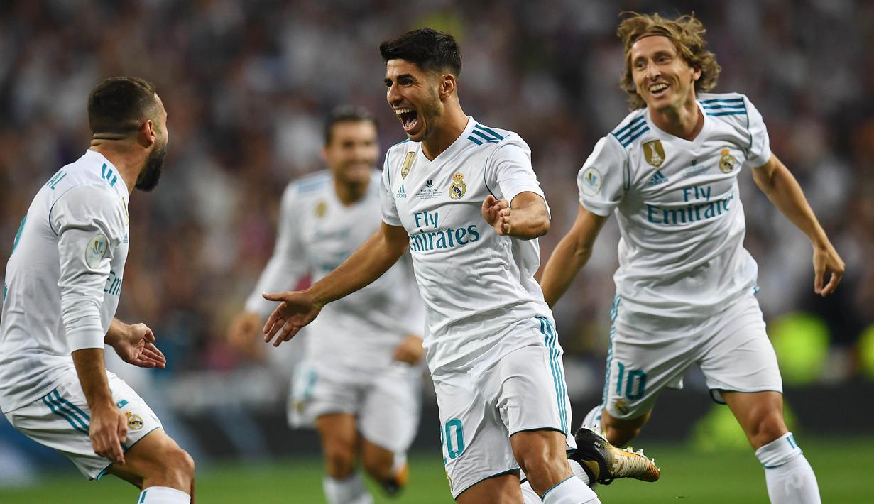 Semakin matangnya permainan Asensio membuat Real Madrid menaikan klausul pelepasan Marco Asensio mencapai 500 Juta Euro atau setara Rp 7,85 triliun. Hal itu dilakukan untuk memastikan sang pemain bertahan di Santiago Bernabeu. (AFP/Gabriel Bouys)