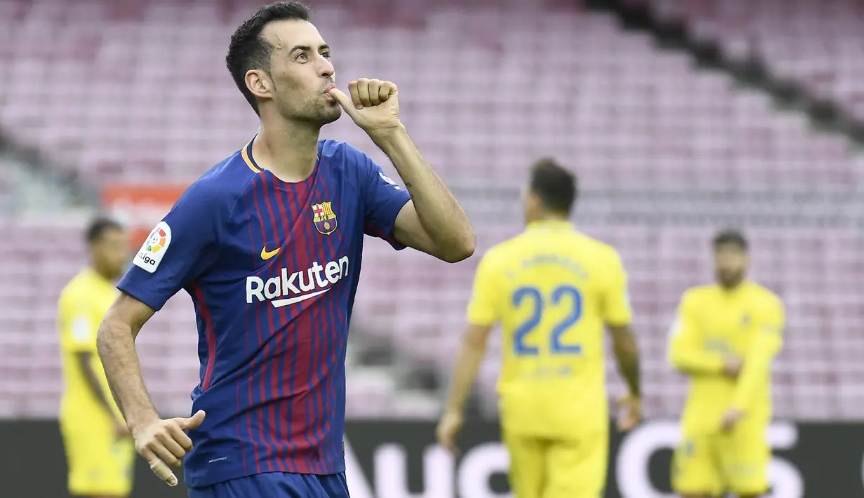 Sergio Busquets menjalin kontrak dengan Barcelona hingga 30 juni 2021 dan menerima gaji sebesar 180.000 pound sterling per minggu. (AFP/Jose Jordan)