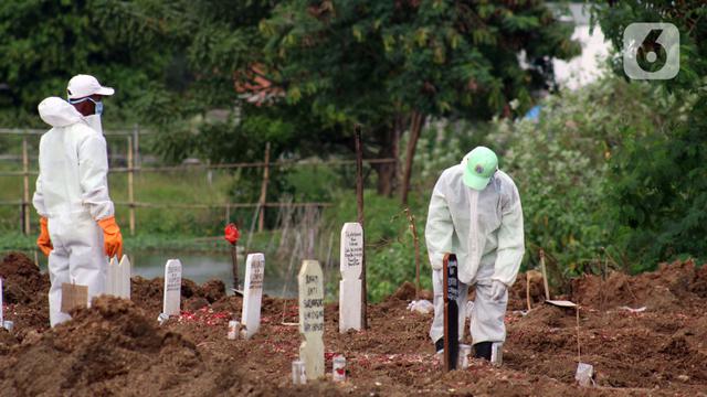 Pengalaman Menegangkan Penggali Makam Pasien Covid 19 Di Palembang Regional Liputan6 Com