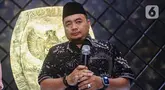 Komisioner Komisi Pemilihan Umum (KPU) Mochammad Afifuddin memberikan keterangan terkait pemilihan pelaksana tugas Ketua KPU di Kantor KPU, Jakarta Pusat, Kamis (4/7/2024). (Liputan6.com/Angga Yuniar)