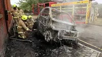 Mobil listrik kebakar (Foto:Telegraph)