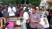 Dua pengayuh becak pendukung Jokowi-JK. (Liputan6.com/Fathi Mahmud)