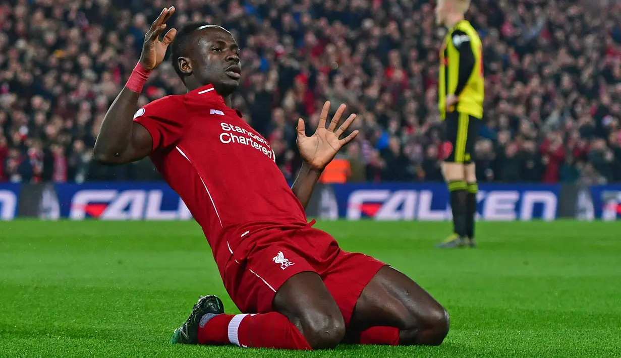 Duet Salah di Liverpool, Sadio Mane juga sukses menjadi salah satu pemain Afrika tertajam di Liga Inggris. Pemain berkebangsaan Senegal tersebut saat ini tercatat mampu mengoleksi total 100 gol dengan rincian 21 gol bersama Southampton dan 79 gol bersama Liverpool. (AFP/Anthony Devlin)