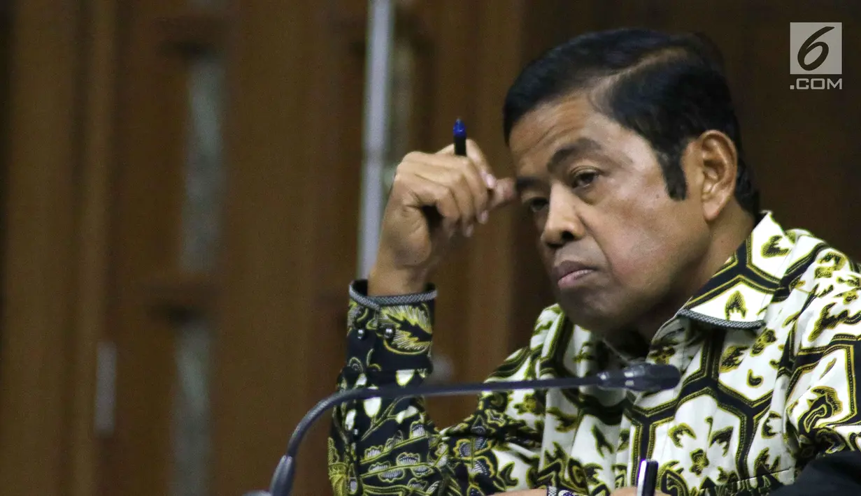 Terdakwa dugaan penerimaan suap terkait kerja sama pembangunan PLTU Riau-1, Idrus Marham saat menjalani sidang lanjutan di Pengadilan Tipikor, Jakarta, Selasa (22/1). Sidang beragendakan pemeriksaan saksi. (Liputan6com/Helmi Fithriansyah)