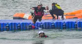 Peserta saat mengikuti lomba lari, renang dan dayung di Situ Gintung, Tangerang Selatan, Banten, Senin, 17 Agustus 2026. (KLY/Arie Basuki)