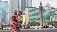 "Setelah tiga tahun lebih kita berjuang bersama menghadapi pandemi Covid-19, sejak hari ini, Rabu, 21 Juni 2023, pemerintah memutuskan untuk mencabut status pandemi dan kita mulai memasuki masa endemi," ujar Jokowi, Rabu. (Liputan6.com/Angga Yuniar)