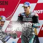 Selebrasi Maverick Vinales (kiri) dan Fabio Quartararo setelah meraih podium pada MotoGP Belanda di Sirkuit Assen, Minggu (30/6/2019). (AFP/Vincent Jannink)