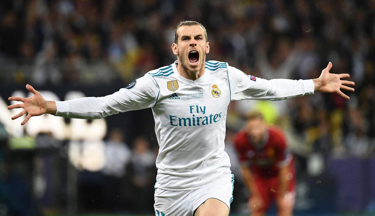 Gareth Bale. Pemain sayap Wales berusia 32 tahun yang telah berseragam Real Madrid selama 8 musim sejak 2013/2014 ini telah mencetak 16 gol di Liga Champions bersama Los Blancos. Jumlah gol tersebut dicetaknya dari total 56 laga. (AFP/Franck Fife)