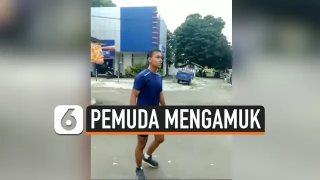 VIDEO: Ditegur Tidak Memakai Masker Seorang Pemuda Mengamuk