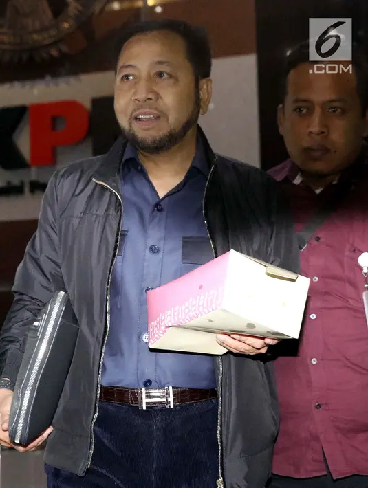 Terpidana korupsi E-KTP, Setya Novanto (kiri) usai menjalani pemeriksaan di Gedung KPK, Jakarta, Kamis (12/9/19). SN diperiksa sebagai saksi kasus tindak pidana korupsi Pengadaan Paket Penerapan E-KTP dengan tersangka Dirut PT Sandipala Arthaputra Paulus Tannos. (Liputan6.com/Helmi Fithriansyah)