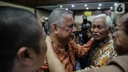 Ekspresi mantan Direktur Utama PT PLN Sofyan Basir usai sidang pembacaan putusan di Pengadilan Tipikor, Jakarta, Senin (4/11/2019). Sofyan Basir divonis bebas dalam kasus dugaan suap proyek PLTU Riau-1. (Liputan6.com/Faizal Fanani)
