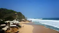 Suasana Pantai Watu Lawang di Desa Tepus, Kecamatan Tepus, Gunungkidul,Daerah Istimewa Yogyakarta, Jumat (20/7/2018). (Harian Jogja/Herlambang Jati Kusumo/Solopos.com)