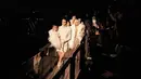 North West, Kendall Jenner, Kourtney Kardashian, Kim Kardashian, Khloe Kardashian dan Kylie Jenner ketika menghadiri Kanye West Yeezy Season 3 di Madison Square Garden, New York, Kamis (11/2). (Dimitrios Kambouris/Getty Images untuk Yeezy Season 3 /AFP)