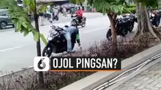 Warga dihebohkan dengan seorang driver ojek online atau ojol yang tergeletak di atas motornya. Tak ada yang berani mendekati driver ojol tersebut karena waspada akan virus corona.