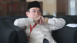 Pihak pengelola pesantren, HMN Lesmana berada di ruang tunggu untuk menjalani pemeriksaan di Gedung KPK, Jakarta, Rabu (26/6/2019). Lesmana diperiksa sebagai saksi terkait kasus dugaan penyunatan anggaran dan gratifikasi yang menyeret  mantan Bupati Bogor Rachmat Yasin. (merdeka.com/Dwi Narwoko)