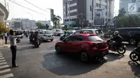Kebijakan ganjil genap di Jakarta terus menjadi bagian penting dalam upaya mengatasi kemacetan. (Liputan6.com/Faizal Fanani)