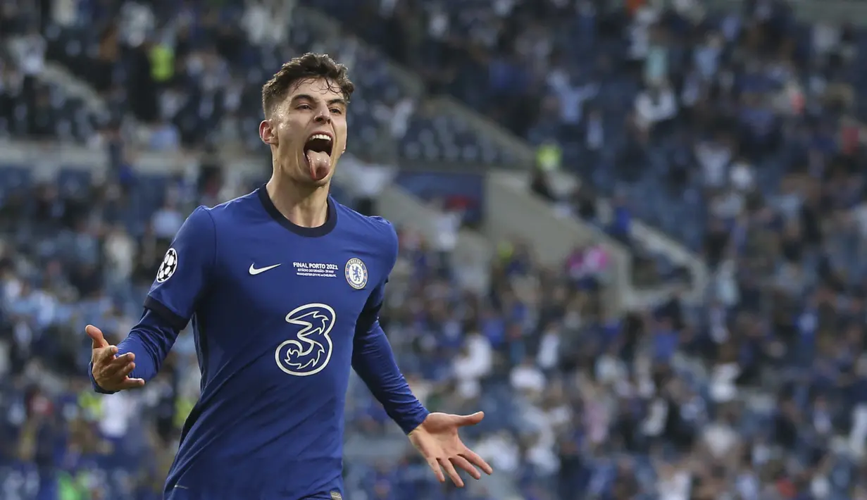 Penyerang Chelsea, Kai Havertz berselebrasi usai mencetak gol ke gawang Manchester City pada pertandingan final Liga Champions di Stadion Dragao, Porto, Portugal, Minggu (30/5/2021). Havertz tampil jadi pahlawan timnya setelah mencetak gol satu-satunya di pertandingan ini. (Jose Coelho/Pool via AP)