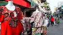 Gapura bertuliskan “Batavia Passer Baroe 1820” masih berdiri kokoh di ujung Jalan Pos menjadi penanda sejarah keberadaan pusat aktivitas niaga tersebut. (Liputan6.com/Herman Zakharia)
