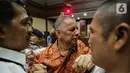 Ekspresi mantan Direktur Utama PT PLN Sofyan Basir usai sidang pembacaan putusan di Pengadilan Tipikor, Jakarta, Senin (4/11/2019). Sofyan Basir divonis bebas dalam kasus dugaan suap proyek PLTU Riau-1. (Liputan6.com/Faizal Fanani)