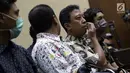 Terdakwa dugaan suap jual beli jabatan di lingkungan Kemenag, M Romahurmuziy jelang menjalani sidang lanjutan di Pengadilan Tipikor, Jakarta, Senin (23/9/2019). Sidang beragendakan pembacaan eksepsi yang dibacakan terdakwa dan penasehat hukum terdakwa. (Liputan6.com/Helmi Fithriansyah)