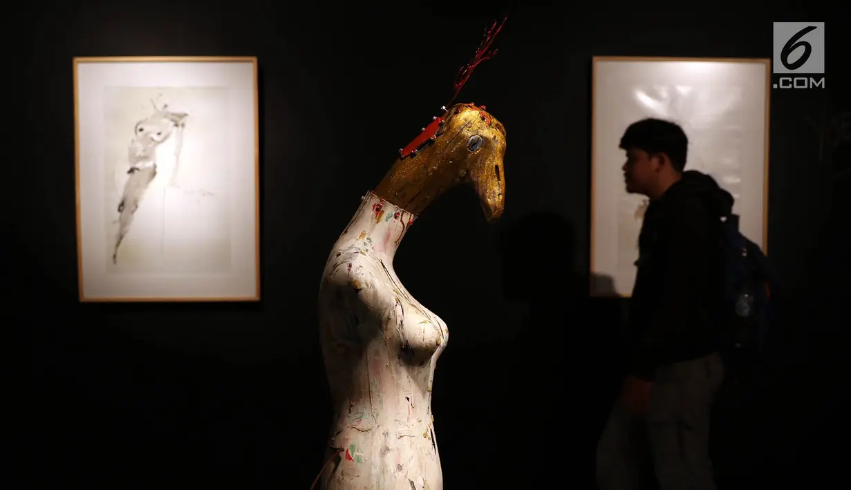 Sebuah karya yang dipajang dalam pameran bertajuk Jakarta Open Studio di TIM, Jakarta, Senin (17/7). Pameran ini mengajak pengunjung untuk terlibat langsung dalam pembuatan karya sesuai dengan karakter dari perupa. (Liputan6.com/Immanuel Antonius)