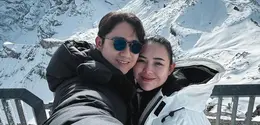 Kenny Austin dan Amanda Manopo Babymoon ke Tiga Negara Eropa dengan busana musim dingin. [@kennyauztin]