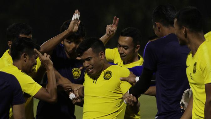 Pemain Timnas Malaysia, Safawi Rasid, saat latihan jelang laga kualifikasi Piala Dunia di Lapangan ABC, Senayan, Jakarta, Selasa (3/9). Malaysia akan berhadapan dengan Indonesia. (Bola.com/M Iqbal Ichsan)