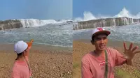 Tangkapan layar pemandangan Pantai Karang Taraje yang unik dan punya karang penghalang serta air terjun. (dok. Instagram @sawarnabeach/https://www.instagram.com/reel/C7gTVbdyW6J/?utm_source=ig_web_copy_link/Rusmia Nely)