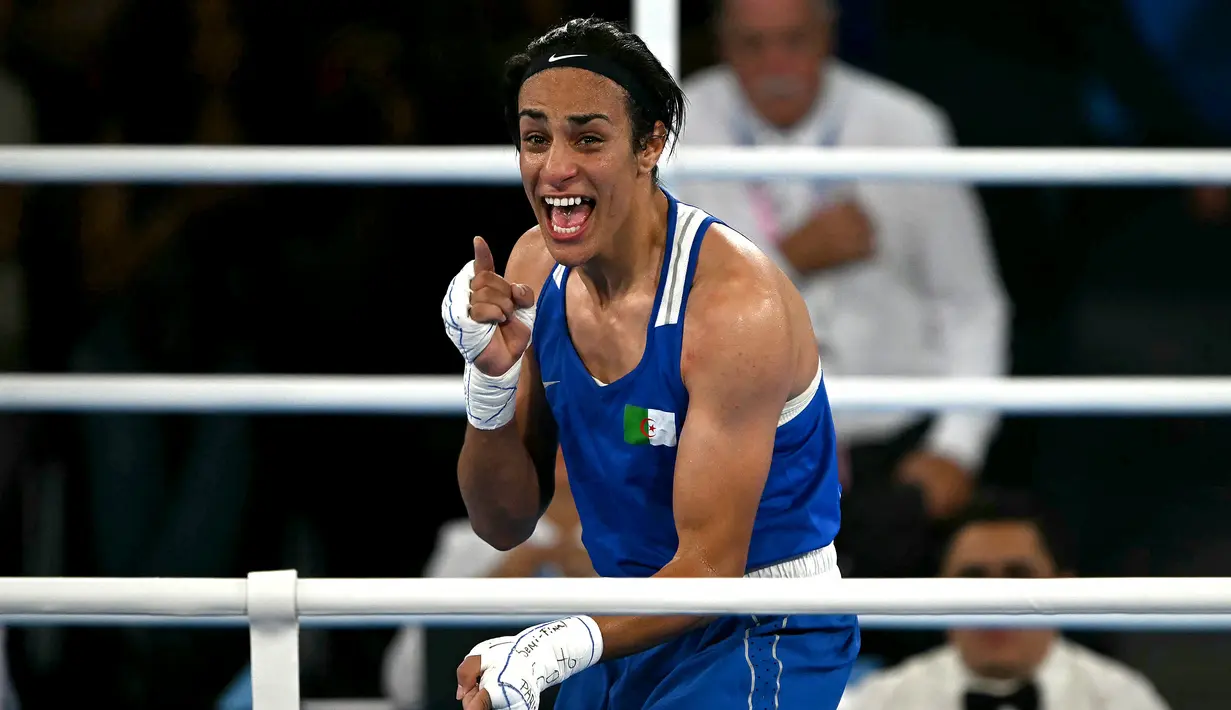 Imane Khelif sebelumnya menjadi sorotan setelah kemenangan 46 detik atas petinju Italia Angela Carini. Banyak narasi yang meragukan jenis kelamin Khelif. (Mauro PIMENTEL / AFP)