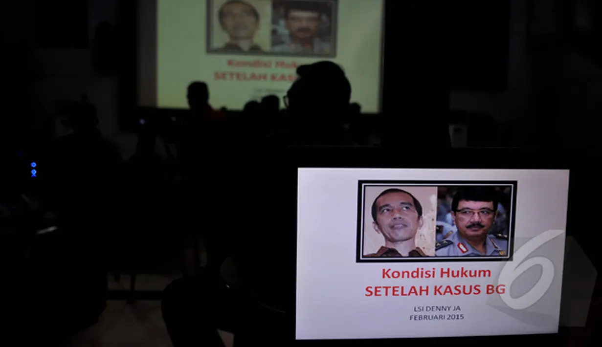 LSI rilis survei dengan tema "Kondisi Hukum Setelah Kasus BG", Jakarta, Selasa (24/2/2015). Tampak foto Jokowi dan Budi Gunawan dalam layar laptop(Liputan6.com/Johan Tallo) 