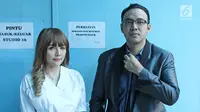 Sandy Tumiwa dan Shinta Bebi (Herman Zakharia/Liputan6.com)