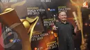 Firman Triadi pemenang Penulis Cerita Asli di malam Anugerah Piala Vidia FFI 2013 dalam filmnya yang berjudul 'Pahlawan Terlupakan' (Liputan6.com/Andrian M Tunay)