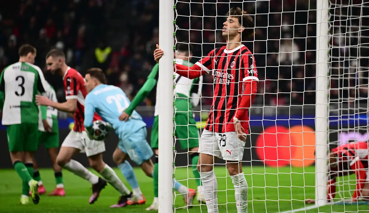 Meski, AC Milan berusaha keras memenangkan laga melawan leg kedua play-off fase gugur Liga Champions 2024/2025 melawan Feyenoord. Namun, disiplin pemain Feyenoord berhasil meredam gempuran serangan AC Milan. (Marco BERTORELLO/AFP)