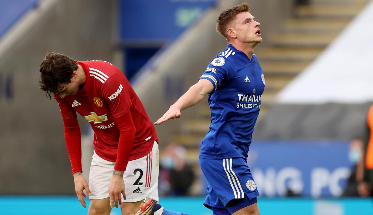 Pemain Leicester City, Harvey Barnes, melakukan selebrasi usai mencetak gol ke gawang Manchester United pada laga Liga Inggris di Stadion King Power, Sabtu (26/12/2020). Kedua tim bermain imbang 2-2.
(AFP/Pool/Glyn Kirk)