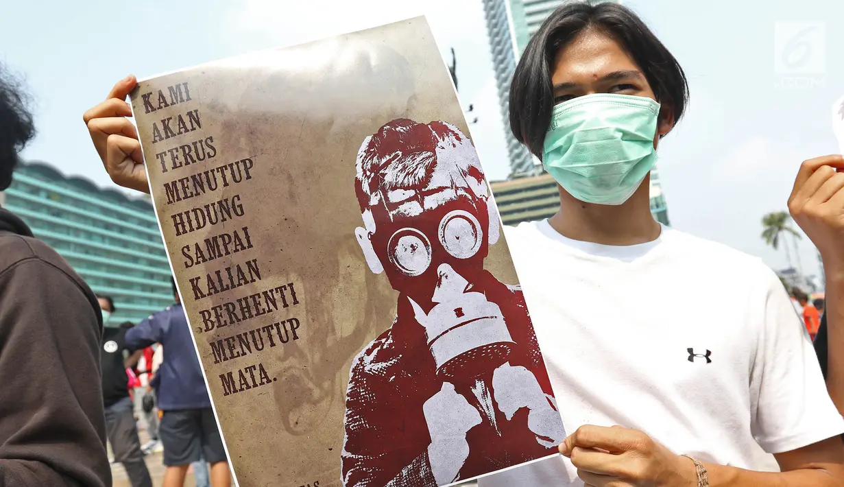 Masyarakat yang tergabung dalam organisasi Lingkar Ganja Nusantara (LGN) Jakarta melakukan aksi yang bertajuk Selamatkan Hutan Indonesia pada Car Free Day di Kawasan Bundaran HI, Jakarta, Minggu (29/9/2019).  (Liputan6.com/Herman Zakharia)