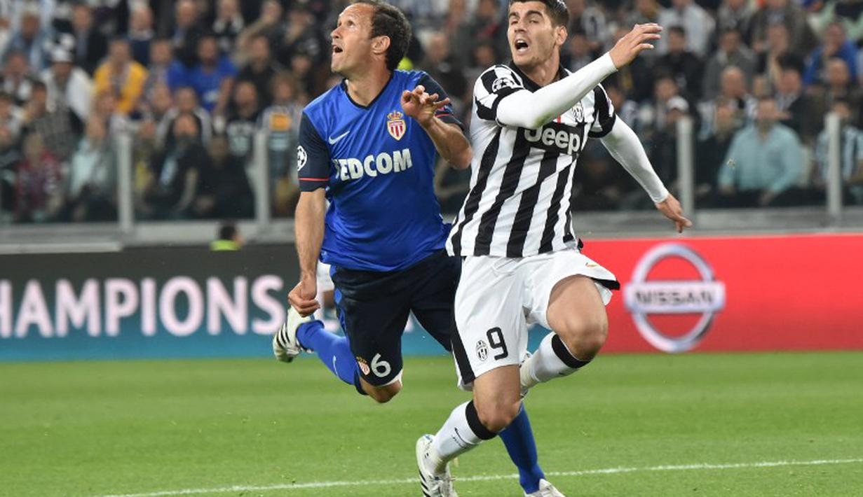 Di laga ini, Juventus unggul via tendangan penalti Arturo Vidal namun dalam prosesnya Alvaro Morata dijatuhkan di kotak terlarang . (GIUSEPPE CACACE / AFP)