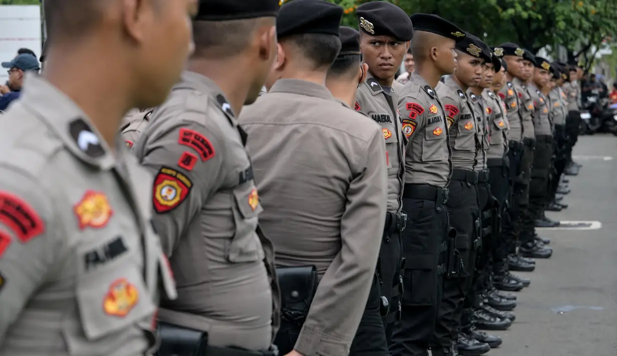 Keputusan ini diambil dalam rapat paripurna yang dihadiri oleh sejumlah Menteri pada Kabinet Merah Putih di DPR RI di Jakarta pada Kamis 20 Maret 2025. (BAY ISMOYO/AFP)