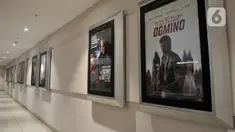 Suasana Cinema XXI di salah satu pusat perbelanjaan kawasan Jakarta Timur ditutup sementara, Senin (23/3/2020). Guna mencegah penyebaran Covid-19, bioskop Cinema XXI di DKI Jakarta dan beberapa kota di Indonesia ditutup sementara mulai hari ini hingga 5 April 2020. (merdeka.com/Iqbal S. Nugroho)