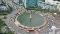 Suasana di kawasan Bundaran HI, Jakarta, Rabu (21/12). Kepala Badan Kebijakan Fiskal (BKF) Suahasil Nazar menyebutkan bahwa pajak menjadi tulang punggung bagi aktivitas perekonomian negara dalam jangka panjang. (Liputan6.com/Angga Yuniar)