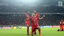 Pemain Persija, Marko Simic (kedua kiri) merayakan gol ke gawang Johor Darul Takzim pada lanjutan penyisihan Grup H Piala Asia 2018 di Stadion GBK, Jakarta, Selasa (10/4). Persija menang telak 4-0. (Liputan6.com/Helmi Fithriansyah)